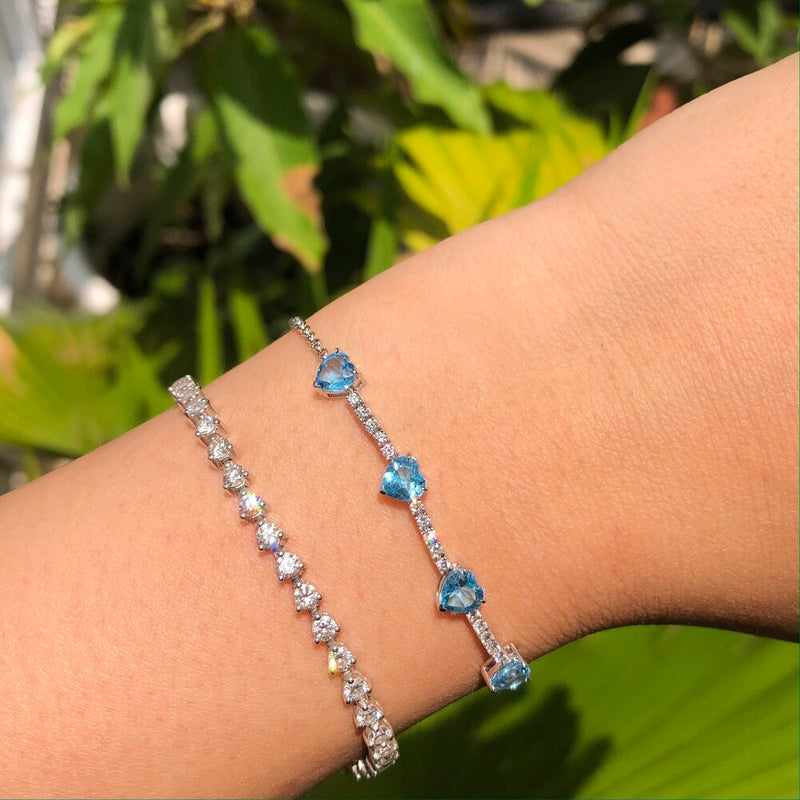 Classy Diamond and Blue Topaz Tennis Bracelet in Gold For Sale at 1stDibs